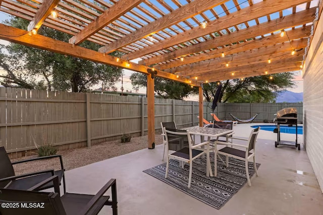 5601 E Baker St, Tucson, AZ 85711 - fenced backyard featuring a patio and outdoor dining space