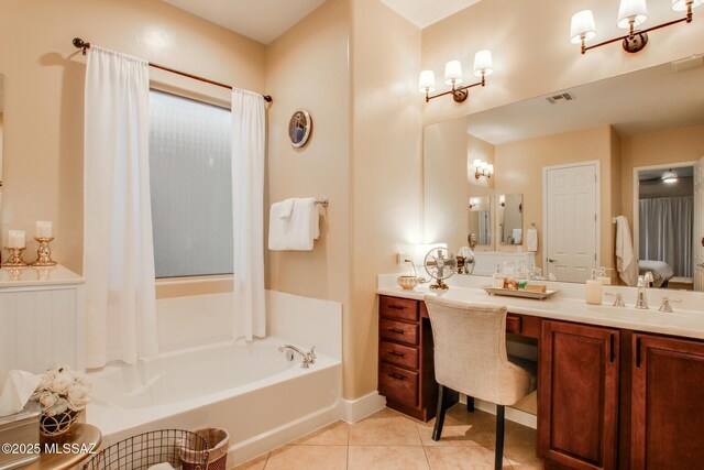 5457 S Canyon Oak Dr, Tucson, AZ 85747 - bathroom with a bath, vanity, and tile patterned floors