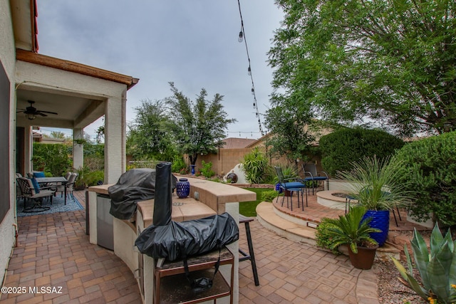5457 S Canyon Oak Dr, Tucson, AZ 85747 - view of patio / terrace with a ceiling fan and outdoor dining area
