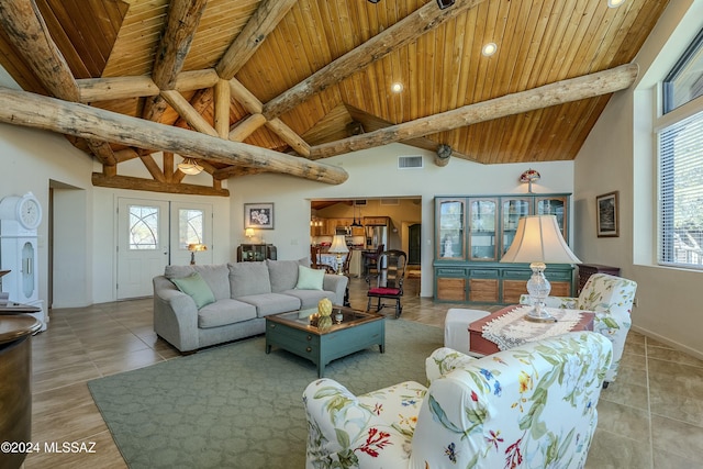 11569 E Speedway Blvd, Tucson, AZ 85748 - tiled living area featuring wooden ceiling with exposed beams, french doors, recessed lighting, and high vaulted ceiling