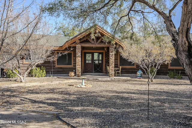 11569 E Speedway Blvd, Tucson, AZ 85748 - view of front facade featuring log siding