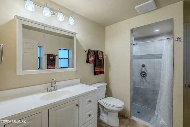 11569 E Speedway Blvd, Tucson, AZ 85748 - full bathroom with toilet, vanity, tiled shower, and tile patterned flooring