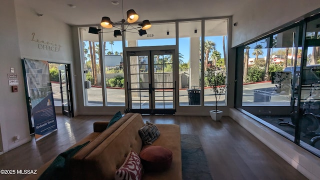 425 W Paseo Redondo Unit 3D, Tucson, AZ 85701 - doorway to outside with wood finished floors, french doors, and a chandelier