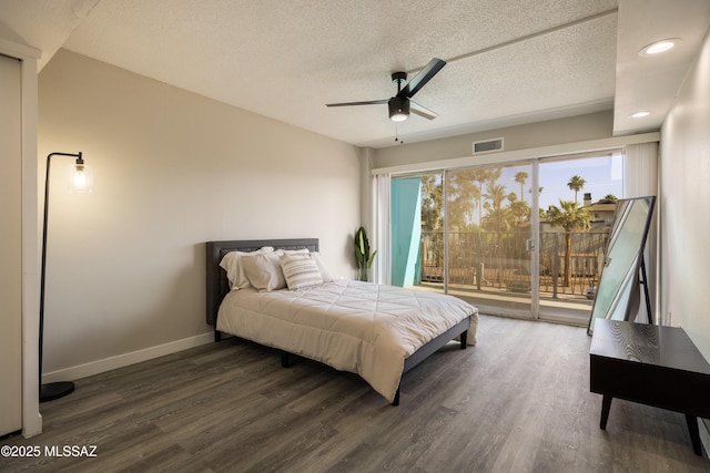 425 W Paseo Redondo Unit 3D, Tucson, AZ 85701 - bedroom featuring access to outside, dark wood finished floors, a textured ceiling, baseboards, and recessed lighting