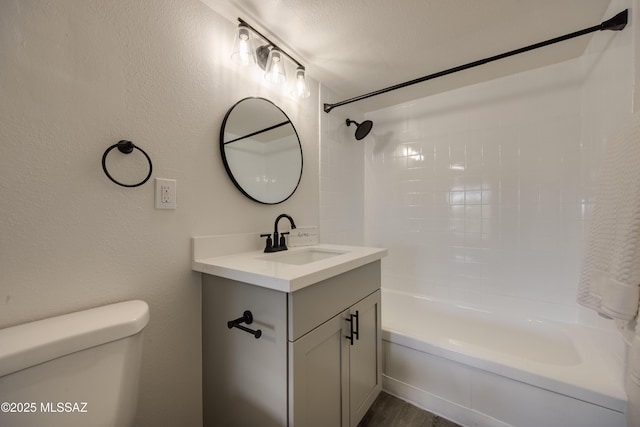 425 W Paseo Redondo Unit 3D, Tucson, AZ 85701 - bathroom featuring vanity, shower / bathtub combination, and toilet