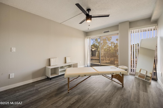 425 W Paseo Redondo Unit 3D, Tucson, AZ 85701 - recreation room with wood finished floors, a ceiling fan, a textured ceiling, and baseboards