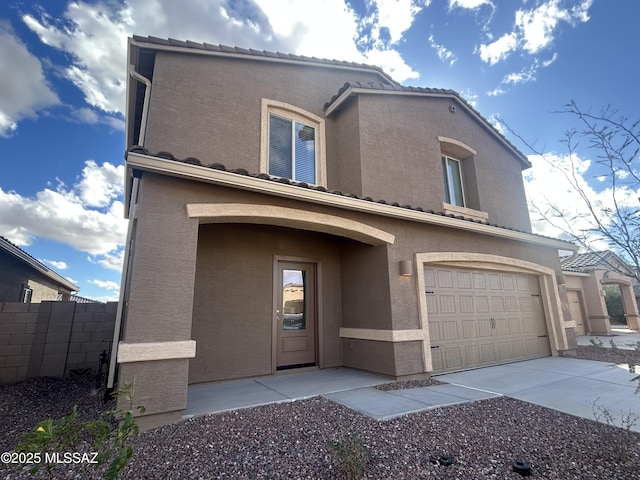 21903 E Wayward Ln, Red Rock, AZ 85145 - mediterranean / spanish-style house with an attached garage, stucco siding, driveway, and a tile roof
