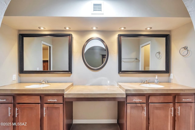 2435 N Shade Tree Cir, Tucson, AZ 85715 - bathroom with vanity and recessed lighting