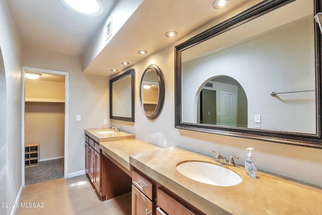 2435 N Shade Tree Cir, Tucson, AZ 85715 - full bath with double vanity and baseboards