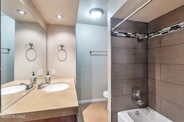 2435 N Shade Tree Cir, Tucson, AZ 85715 - bathroom featuring toilet, vanity, bathing tub / shower combination, recessed lighting, and baseboards