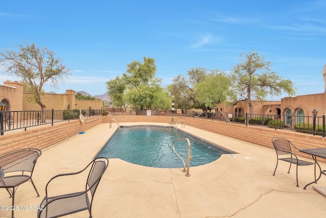2435 N Shade Tree Cir, Tucson, AZ 85715 - community pool featuring a patio area
