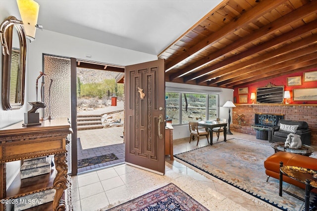 6731 N Pontatoc Rd, Tucson, AZ 85718 - entryway featuring a brick fireplace and wood ceiling with exposed beams