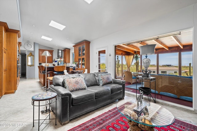 6731 N Pontatoc Rd, Tucson, AZ 85718 - living room featuring vaulted ceiling and light tile patterned floors