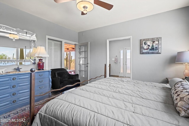 6731 N Pontatoc Rd, Tucson, AZ 85718 - bedroom featuring multiple windows, french doors, and a ceiling fan