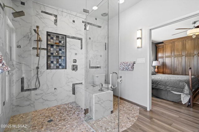 6731 N Pontatoc Rd, Tucson, AZ 85718 - full bath featuring connected bathroom, a marble finish shower, wood finished floors, and baseboards