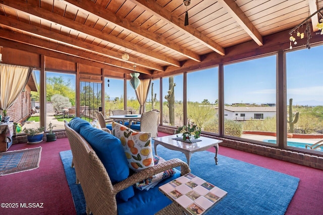 6731 N Pontatoc Rd, Tucson, AZ 85718 - sunroom / solarium featuring carpet floors, plenty of natural light, wooden ceiling with exposed beams, and outdoor dining area