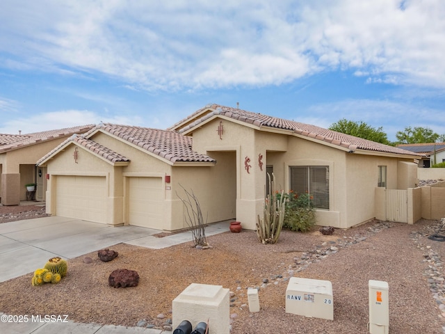 246 W Tabascoe Pl, Oro Valley, AZ 85755 - view of front of house with a garage, stucco siding, concrete driveway, and a tiled roof