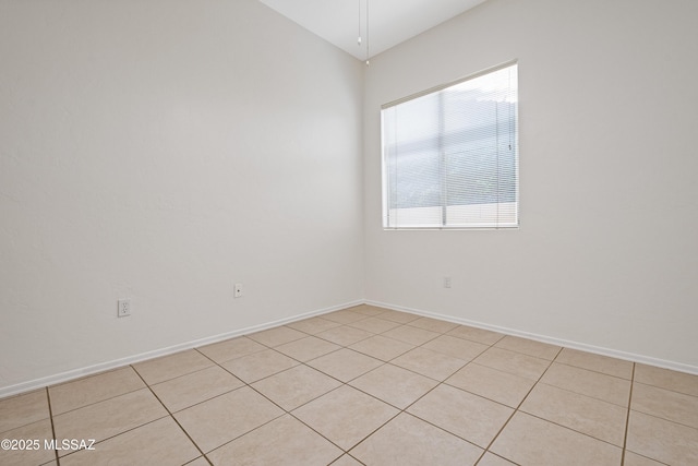 246 W Tabascoe Pl, Oro Valley, AZ 85755 - unfurnished room with baseboards and light tile patterned flooring