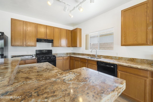 3347 S Desert Scroll Pl, Tucson, AZ 85735 - kitchen featuring black appliances, under cabinet range hood, a sink, and light stone countertops