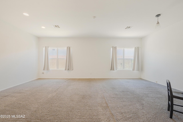 3347 S Desert Scroll Pl, Tucson, AZ 85735 - carpeted empty room featuring plenty of natural light, baseboards, and recessed lighting