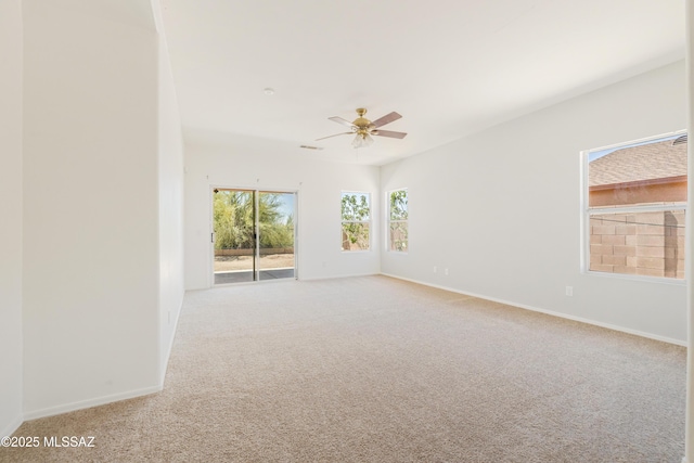 3347 S Desert Scroll Pl, Tucson, AZ 85735 - carpeted spare room with ceiling fan and baseboards
