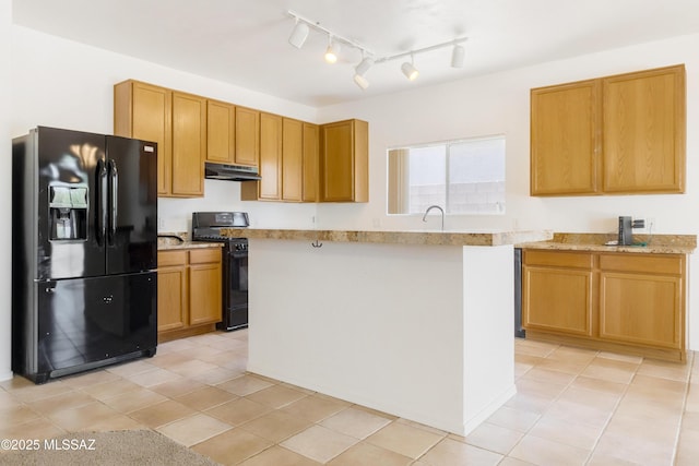 3347 S Desert Scroll Pl, Tucson, AZ 85735 - kitchen with black appliances, under cabinet range hood, a center island, light tile patterned floors, and a sink