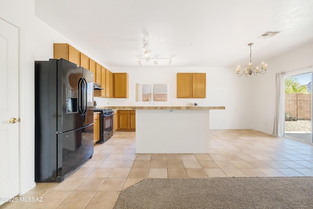 3347 S Desert Scroll Pl, Tucson, AZ 85735 - kitchen with black appliances, a chandelier, light tile patterned flooring, and light countertops