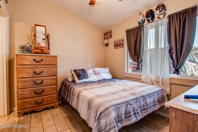 3758 E Ellington Pl, Tucson, AZ 85713 - bedroom featuring light wood-style flooring and ceiling fan