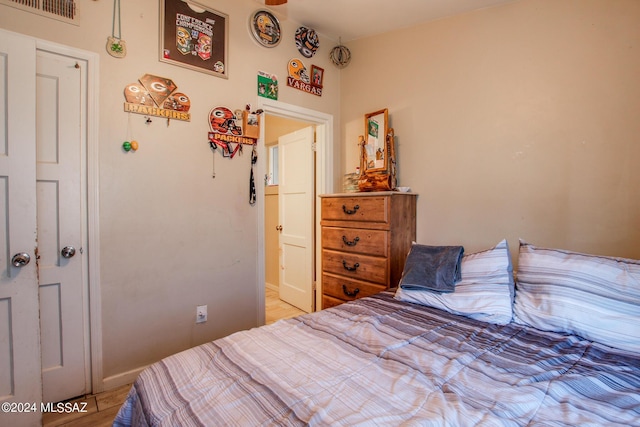3758 E Ellington Pl, Tucson, AZ 85713 - bedroom with light wood-style floors