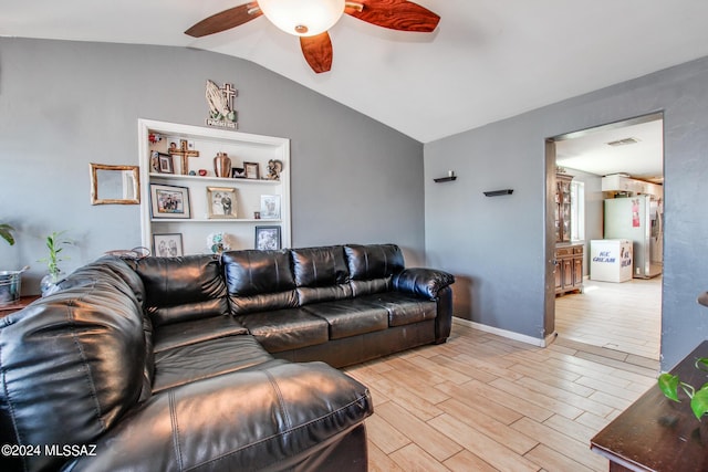 3758 E Ellington Pl, Tucson, AZ 85713 - living room featuring a ceiling fan, lofted ceiling, wood tiled floors, and baseboards