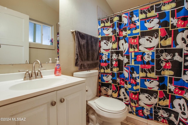 3758 E Ellington Pl, Tucson, AZ 85713 - bathroom with vanity, toilet, and a shower with shower curtain