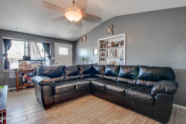 3758 E Ellington Pl, Tucson, AZ 85713 - living room with lofted ceiling, wood finish floors, ceiling fan, and baseboards