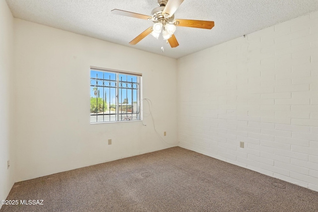 1358 S Desert Meadows Cir, Green Valley, AZ 85614 - carpeted spare room with a ceiling fan and a textured ceiling