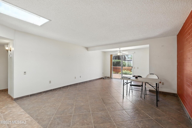 1358 S Desert Meadows Cir, Green Valley, AZ 85614 - dining space with a textured ceiling, ceiling fan, and tile patterned flooring
