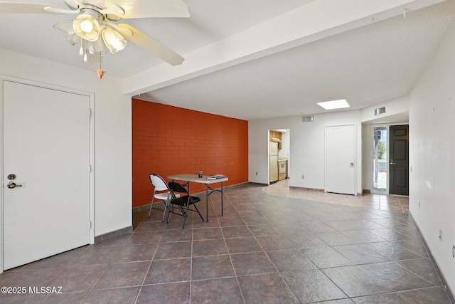 1358 S Desert Meadows Cir, Green Valley, AZ 85614 - dining room featuring a ceiling fan and dark tile patterned flooring