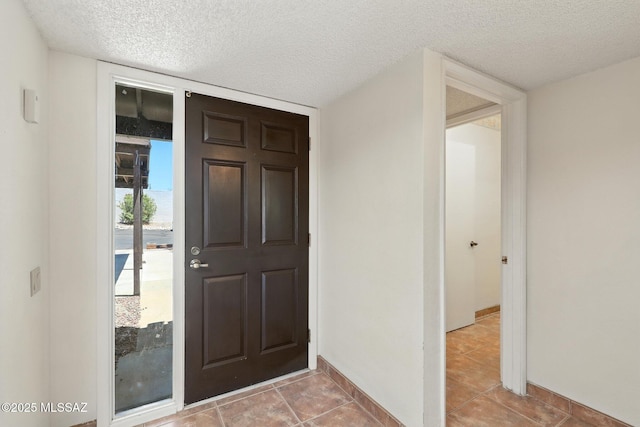 1358 S Desert Meadows Cir, Green Valley, AZ 85614 - tiled entrance foyer with a textured ceiling