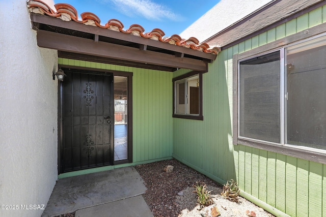 1358 S Desert Meadows Cir, Green Valley, AZ 85614 - view of exterior entry with stucco siding