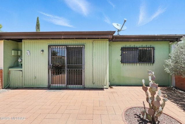1358 S Desert Meadows Cir, Green Valley, AZ 85614 - back of property featuring a patio area