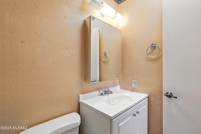 1358 S Desert Meadows Cir, Green Valley, AZ 85614 - bathroom featuring vanity and toilet