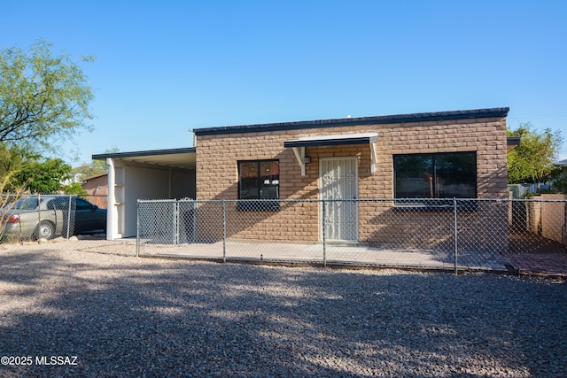 1321 W Saint Clair St, Tucson, AZ 85745 - view of front of house with an attached carport