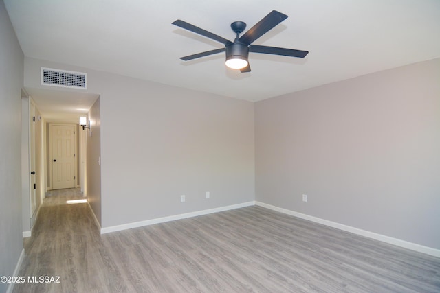 1321 W Saint Clair St, Tucson, AZ 85745 - spare room featuring light wood finished floors, a ceiling fan, and baseboards