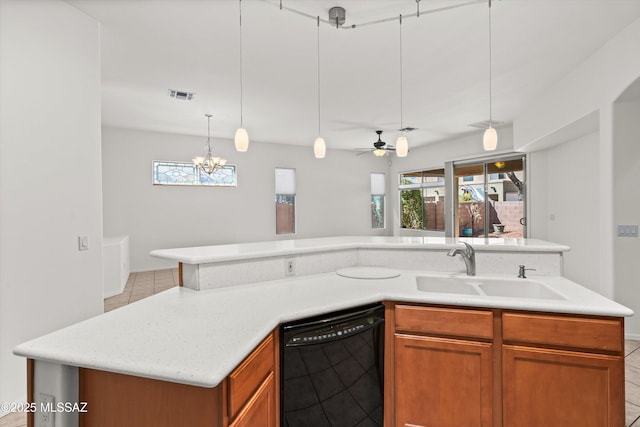 215 E Placita Lago Del Mago, Sahuarita, AZ 85629 - kitchen featuring dishwasher, a sink, light tile patterned floors, and pendant lighting