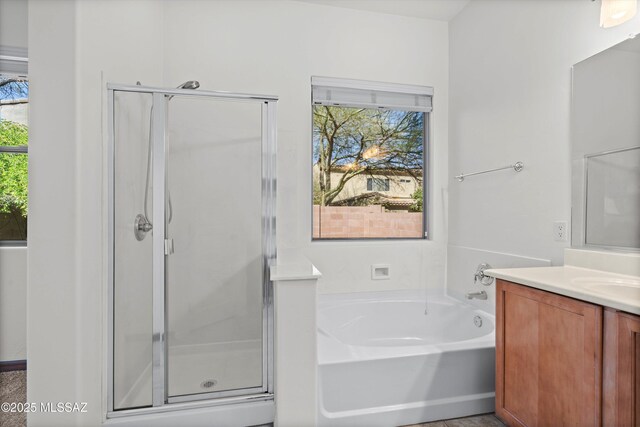 215 E Placita Lago Del Mago, Sahuarita, AZ 85629 - bathroom with vanity, a bath, and a stall shower