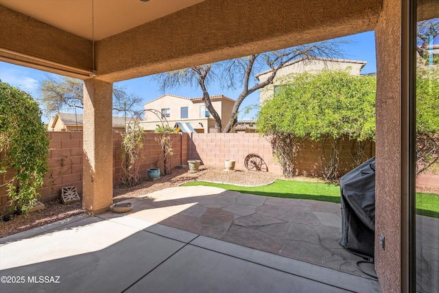 215 E Placita Lago Del Mago, Sahuarita, AZ 85629 - fenced backyard with a patio