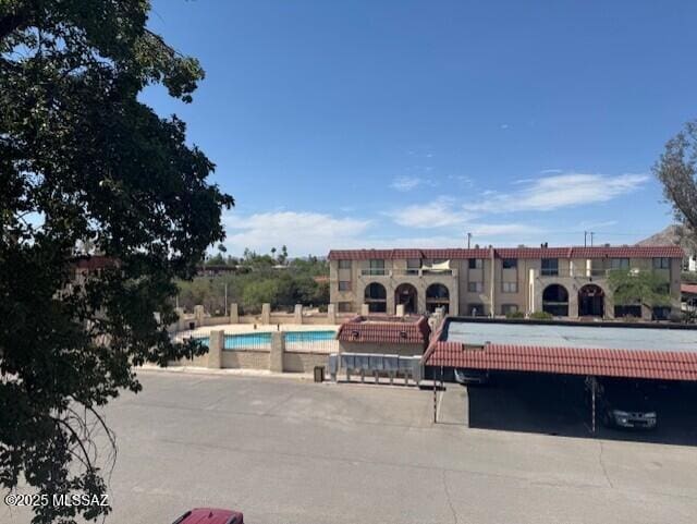 6301 N Barcelona Ct Unit 1010, Tucson, AZ 85704 - view of property with a community pool