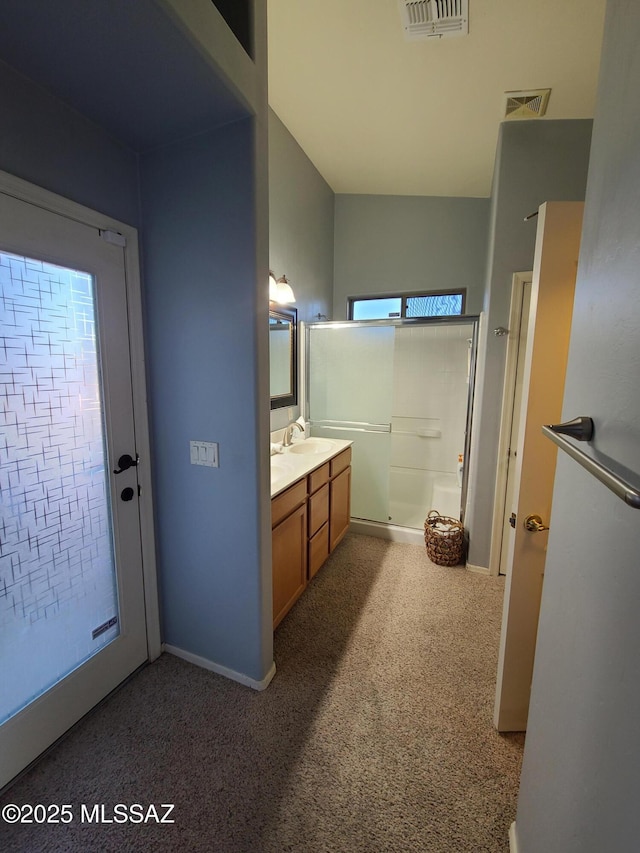 17144 S Scarlet Cliff Pl, Vail, AZ 85641 - full bathroom featuring vanity, carpet, a shower, a bath, and baseboards