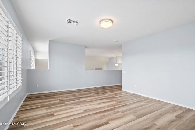 9422 N Weather Hill Dr, Tucson, AZ 85743 - spare room with wood finished floors and baseboards