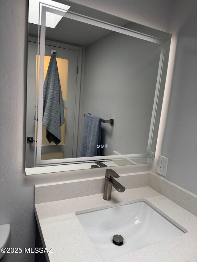 516 E Linden St, Tucson, AZ 85705 - bathroom with vanity and toilet