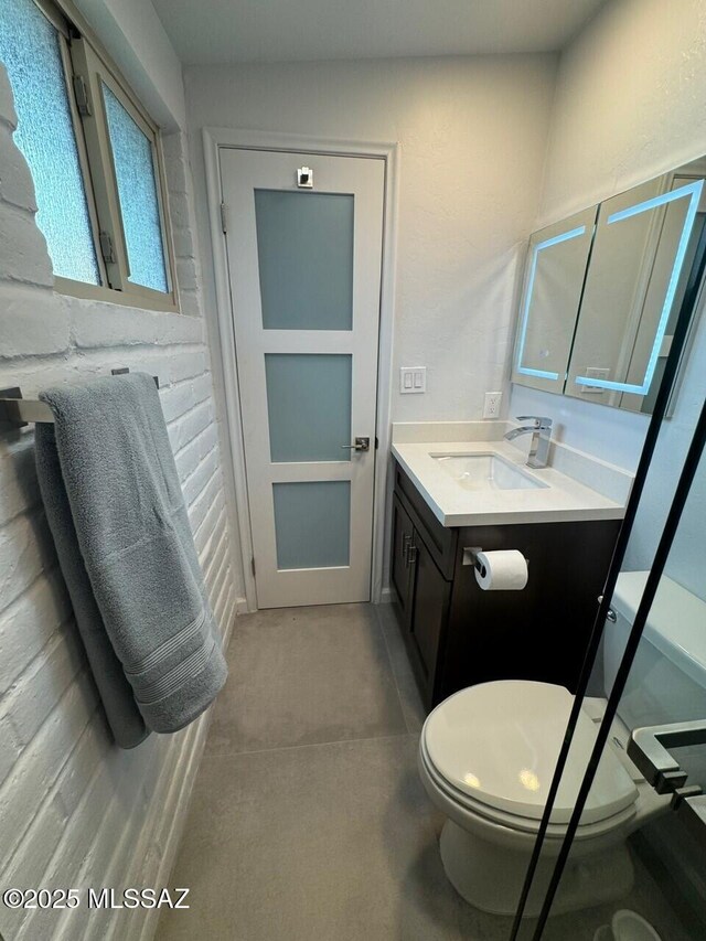 516 E Linden St, Tucson, AZ 85705 - bathroom featuring toilet and vanity