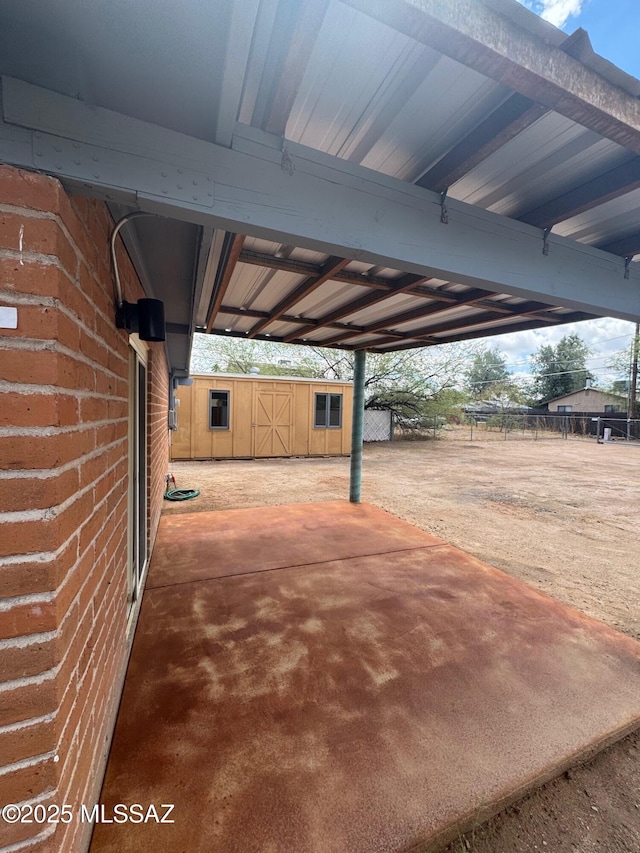 516 E Linden St, Tucson, AZ 85705 - view of patio / terrace featuring an exterior structure and an outbuilding